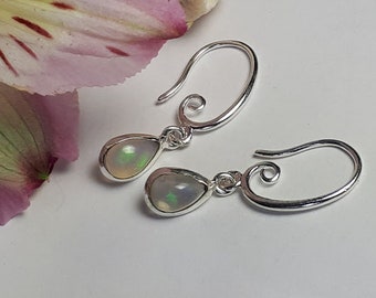 Genuine opal earrings; ethiopian opals, teardrop, set in 92.5 sterling silver