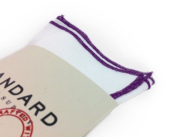 White Pocket Square serged with Purple trim.