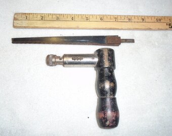 Key hole saw. Saw. Vintage saw. Vintage tool. ratcheting handle.