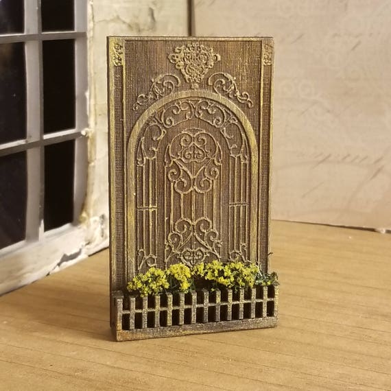 Miniature Dollhouse Planter with wall plaque and carvingfor