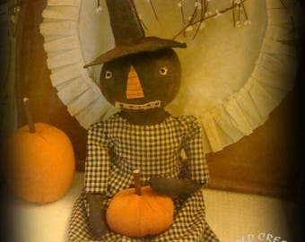 Primitive Harvest Witch Doll Holding Pumpkin