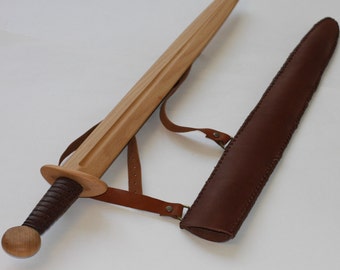 Toy wooden sword with leather sheath