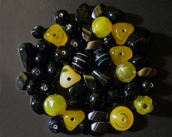 Black, yellow various forms of hematite and glass Indian beads
