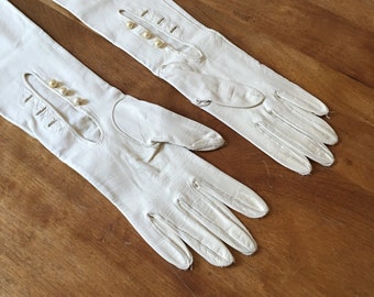 Womens 1950's white kid leather gloves from Marshall Fields Chicago - unworn