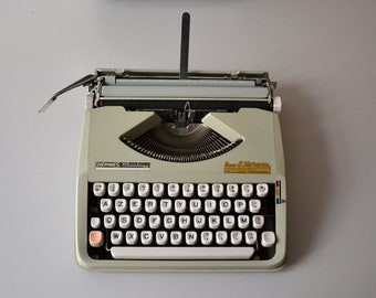 Vintage Hermes Baby Portable Typewriter / portable typewriter / in perfect working condition