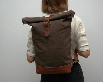 waxed Canvas rucksack/backpack, khaky color, hand waxed , with handles, leather base closures