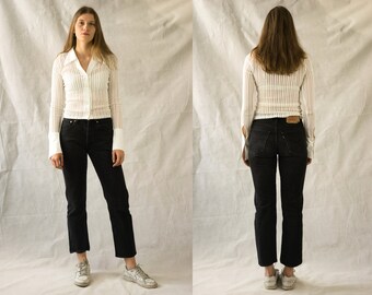 Elegant white blouse with reinforcements