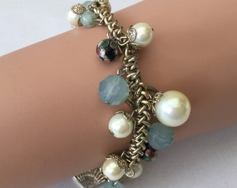 Chunky Golden Metal Switts And Beads Elasticated Bracelet