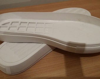 Pair of white Thermoplastic rubbers (TPR) rubber soles. Ideal for making knitted or felted slippers.