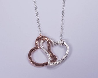 An lovely Pair of unit heart handmade in Rose gold-fill and Sterling silver pendant. 25% Off. Free shipping