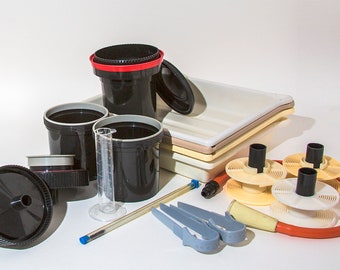 Darkroom equipment - forceps, thermometer, developing tanks, trays, measuring jug