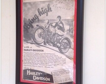 Aged reproduction vintage Harley Davidson Motorcycle Advert in frame.