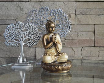 Porte-bougie Bouddha en résine finition bronze-crème, fait à la main à Bali. Visitez notre nouvelle boutique Etsy !