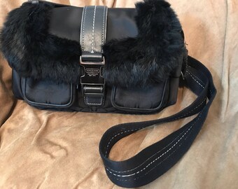 Fur trimmed Coach shoulder bag