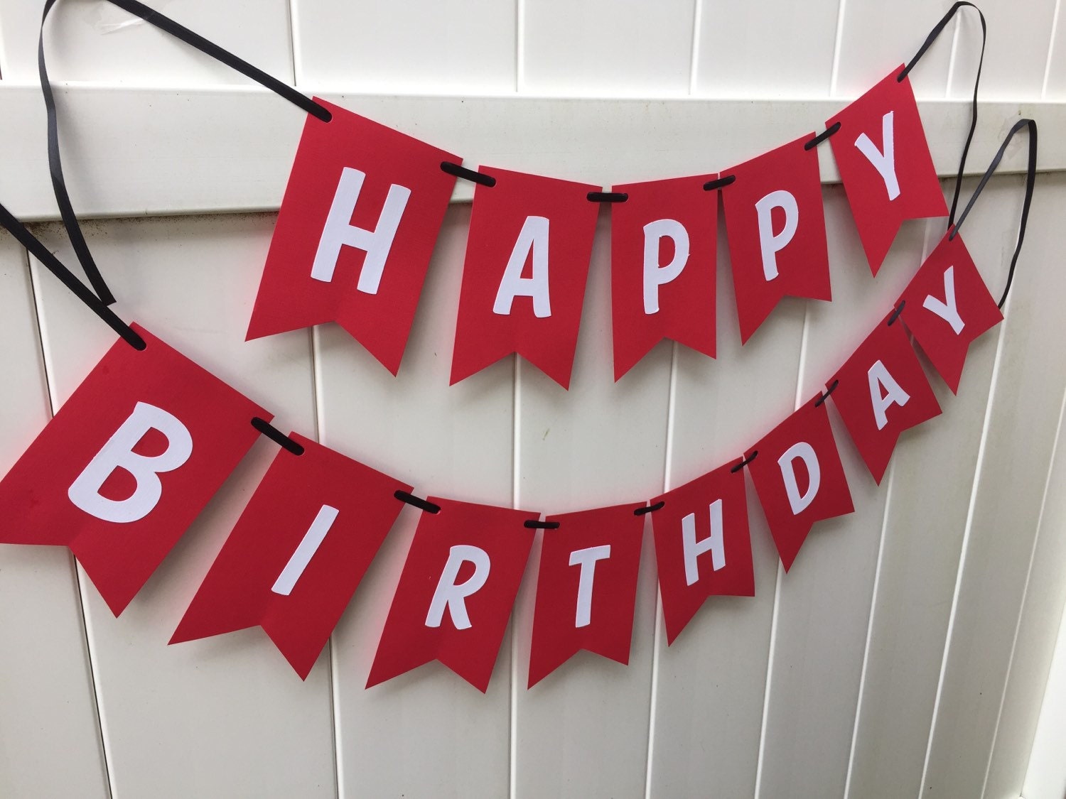 happy birthday banner red and white with black ribbon red and black happy birthday banner