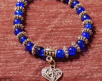 Vibrant blue bracelet with heart charm