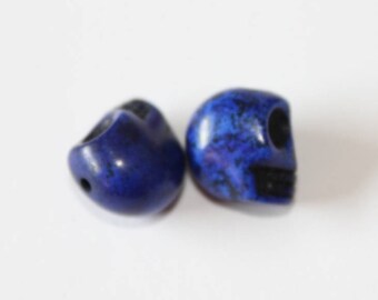 Skull, blue, 12 mm, the pair