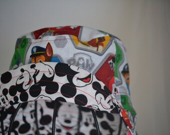 Reversible mickey/paw patrol bucket hat