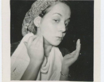 Vintage Snapshot Photo: Young Woman with Face Cream(612525)