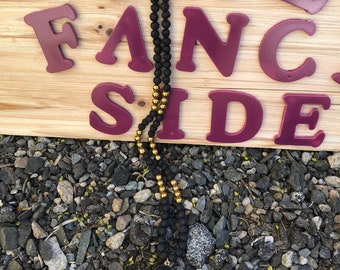 black & gold long beaded necklace with black Druzy pendant