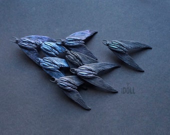 Brooch with a dark moth. 1 piece.