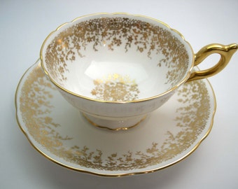 Antique Coalport Tea Cup and Saucer, Gold Filigree tea cup and saucer, Mint condition.
