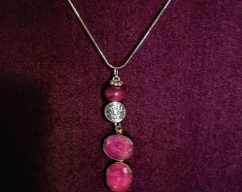 Rough cut ruby pendant necklace.