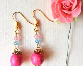 Dangle earrings in pink wooden beads with pink and blue swarovski crystals