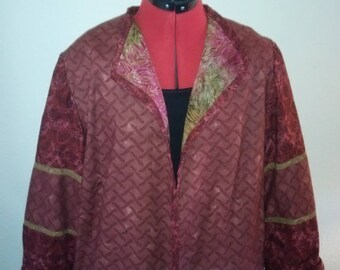 Reversible jacket with hand beading