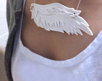 A delicate porcelain pendant with chain