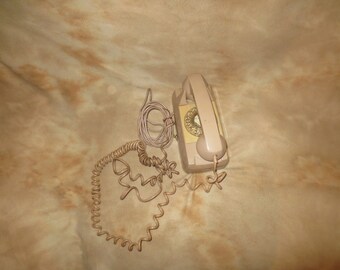 Starlite by Automatic Electric. Made by GTE. Rotary Telephone. Probably 70's