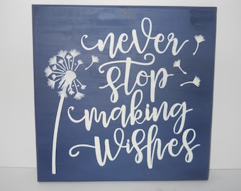Hand made wood wall decor plaque. Never stop making wishes.