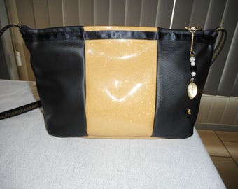 Black and gold shoulder bag