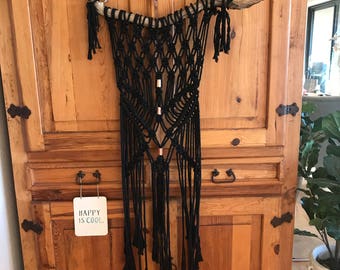Black Beauty macrame on driftwood decorated with copper