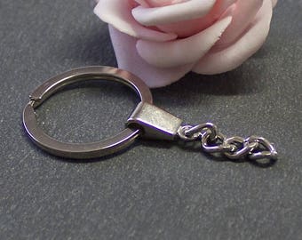 4 platinum silver Keychain of 64 x 30 mm