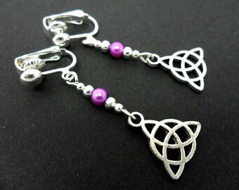 A pair of tibetan silver & purple glass bead celtic knot dangly clip on earrings. new.