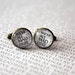 Cufflinks - We're All Mad Here