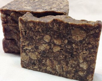 Raw African Black Soap 100% natural. Traditionally used for eczema, acne, dark spots, dryness & sensitive skin. Unscented