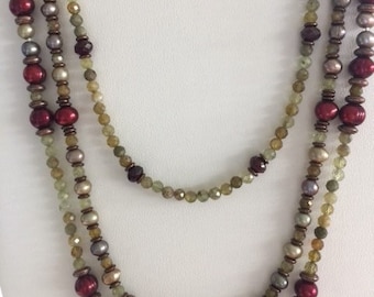 Triple strand pearls.