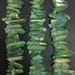Approx 55pcs/str green titanium quartz natural stones stick point pendants,top drilled raw crystals tusk spike beads necklace 6-10x20-34mm