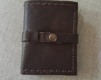 Snap closure brown leather wallet