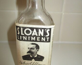 Vintage Sloan's Liniment - bottle 2/3rds full advertising collectable piece. Dr. Carl S. Sloan original piece. Made in USA