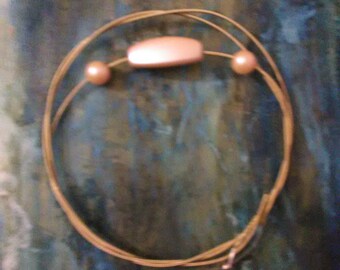 Guitar String Bracelet that is a unique accessory. Twisted from repurposed strings designed to add a little edgy style. One of a kind
