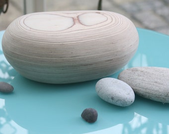Handcrafted wooden cremation or burial urn - a beautiful pebble shaped urn