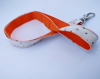 Cord key chain, orange and multicolor sprinkles
