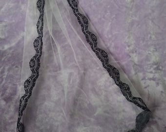 Handsewn black lace trim veil