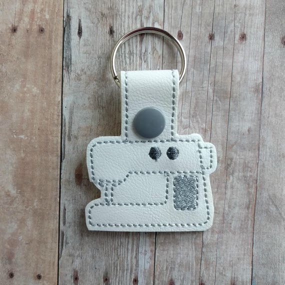 Sewing Machine Key Chain Embroidered White Vinyl Hand Cut