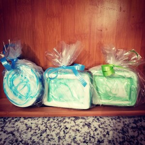 Hand made soap bars with swirls and stone inside! Multiple shapes and scents available!