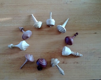 Wooden spinning tops- prices vary!