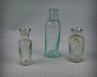 Set of 3 Antique glass bottle , medical or laboratory bottle . Vintage medical glass bottle